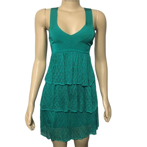 bebe Dresses & Skirts - Bebe Green mini, racer halter back dress. Size XS. New without tags.